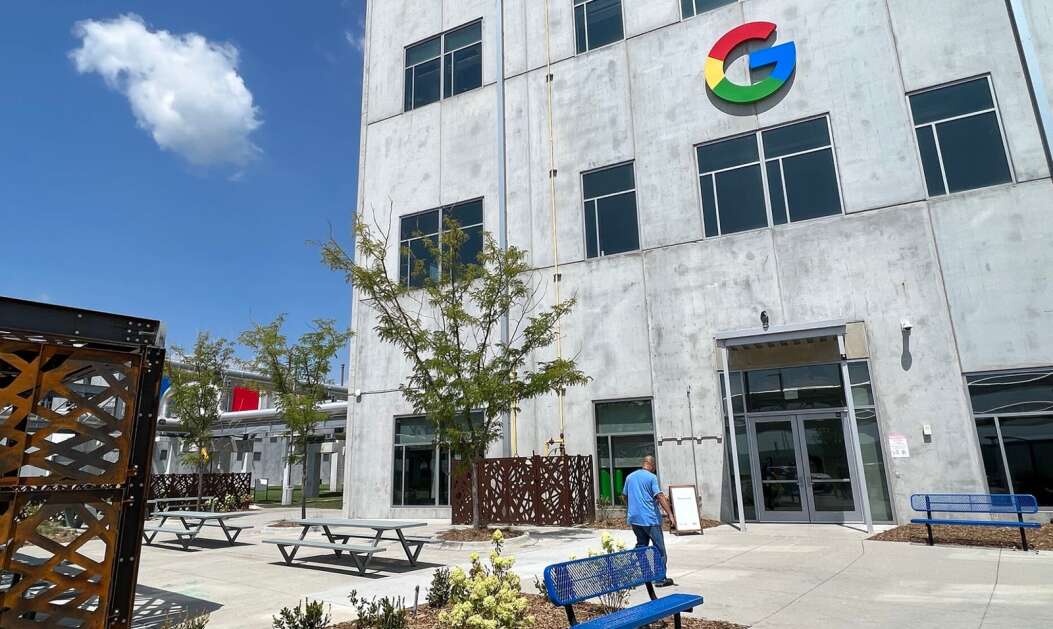 An employee walks Aug, 8. 2023, into Google’s Council Bluffs data center at 10410 Bunge Ave. Google is considering a $576 million data center in Cedar Rapids also. (Scott Stewart/The Nonpareil)