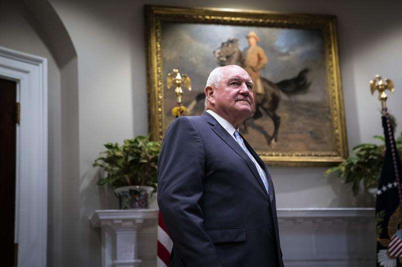 Secretary of Agriculture Sonny Perdue arrives May 23, 2019, in the Roosevelt Room at the White House. Perdue's honeymoon in farm county appears to be over, Last month, farmers booed him in Minnesota after he joked: 'What do you call two farmers in a basement? A whine cellar.' (Jabin Botsford/Washington Post)