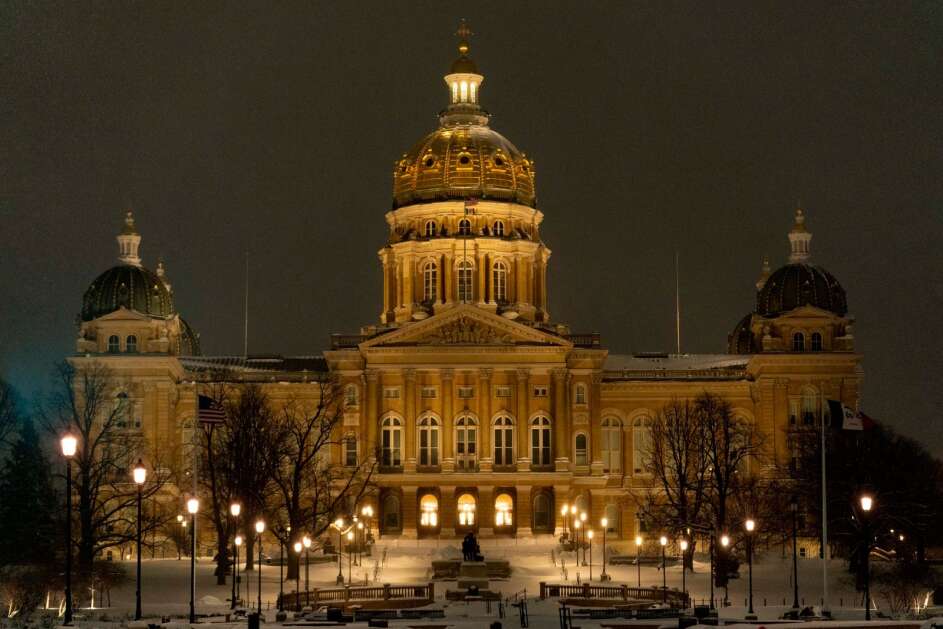 The Iowa State Capitol Building is visible before sunrise in Des Moines on Jan. 12, 2024. (AP Photo/Andrew Harnik)