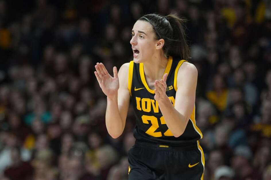 Iowa guard Caitlin Clark (22) claps during the second half of an NCAA college basketball game against Minnesota, Wednesday, Feb. 28, 2024, in Minneapolis. (AP Photo/Abbie Parr)