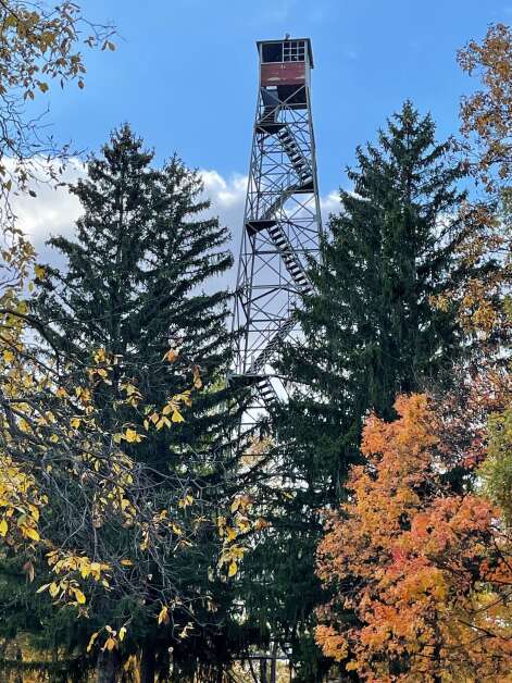 The fire tower in Yellow River State Forest was built in 1963.  Obsolete even before it was built, it never played a role suppressing fires. Visitors are not allow to climb the structure that is now on the National Historic Lookout Register and the National Register of Historic Places. (Rich Patterson)