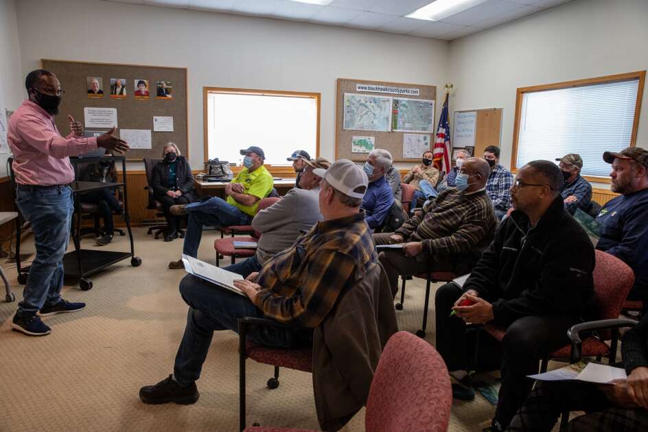 Shaffer Ridgeway discusses a trial program — using bluegrass as a ground cover between rows of crops — with Black Hawk County farmers on Feb. 7. Ridgeway is a farmer and district conservationist for the USDA’s Natural Resource Conservation Service. (Nick Rohlman/The Gazette)