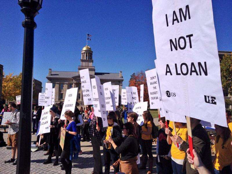 Students gather in front of the Old Capitol Building on the University of Iowa campus to protest against a proposed tuition increase.  (Mark Carlson/The Gazette)