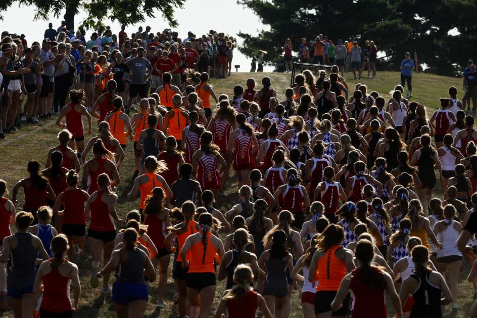 Varsity girls runners attack a hill during the Prairie Invitational cross country meet at Prairie High School in southwest Cedar Rapids, Iowa, on Saturday, August 26, 2023. (Jim Slosiarek/The Gazette)