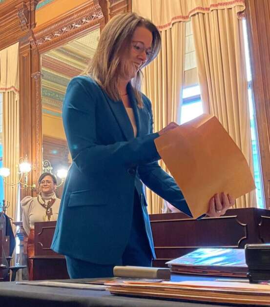 Democrat Christina Bohannan of Iowa City files her nomination petitions Thursday at the Statehouse in Des Moines to seek election in the 1st Congressional District in November. She will be running against the winner of the June 4 Republican primary between U.S. Rep. Mariannette Miller-Meeks of Ottumwa and Davenport minister David Pautsch. (Caleb McCullough/Gazette-Lee Des Moines Bureau)