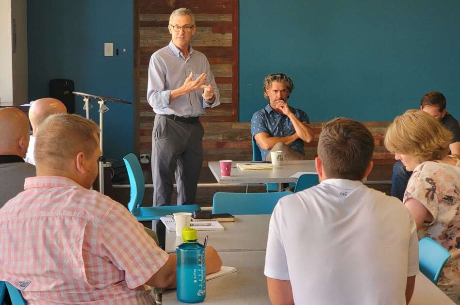 Alex Taylor, managing director of NewBoCo’s Accelerator, welcomes participants to the Business Startup Speaker Series in June at The Vault Coworking Space in Cedar Rapids. The monthly series, offered in Cedar Rapids and Iowa CIty, offers tips to new and veterans business owners. (NewBoCo)