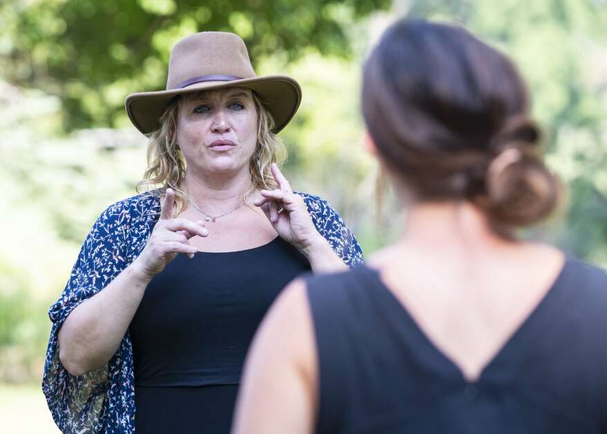Psychotherapist Natalie Benway-Correll of Iowa City goes through an exercise about picking up energy, during The Well Lived Life retreat at Lovely Bunches Farm in Iowa City, Iowa on Sunday, Aug. 20, 2023. (Savannah Blake/The Gazette)