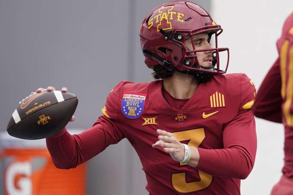 Iowa State quarterback Rocco Becht (3) warms up before the team's Liberty Bowl NCAA college football game against Memphis, Friday, Dec. 29, 2023, in Memphis, Tenn. (AP Photo/George Walker IV)