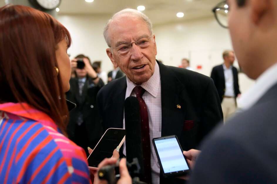 Sen. Chuck Grassley (R-Iowa) speaks with reporters as he arrives at the Capitol to vote, Wednesday, Sept. 6, 2023, in Washington.  (AP Photo/Mark Schiefelbein)