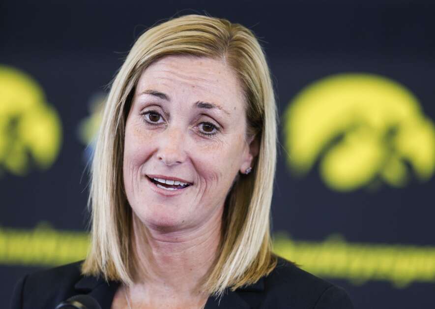 Beth Goetz, then the University of Iowa's interim athletics director, answers reporters' questions Aug. 17 during a news conference at the Carver-Hawkeye Arena in Iowa City. Goetz was named Thursday as the permanent athletics director. (Jim Slosiarek/The Gazette)
