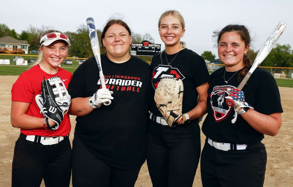 Williamsburg's returning all-staters (from left): Shannon Finn, Elle Ridgeway, Peyton Driscoll and Jenna Thurm during practice at Jim Turner Field in Williamsburg on May 9. The Raiders begin pursuit of a fourth consecutive state-tournament appearance Monday. (Jim Slosiarek/The Gazette)