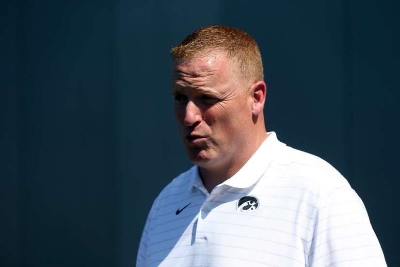 Early tragedy ‘shaped everything’ about George Barnett as Iowa offensive line coach, father