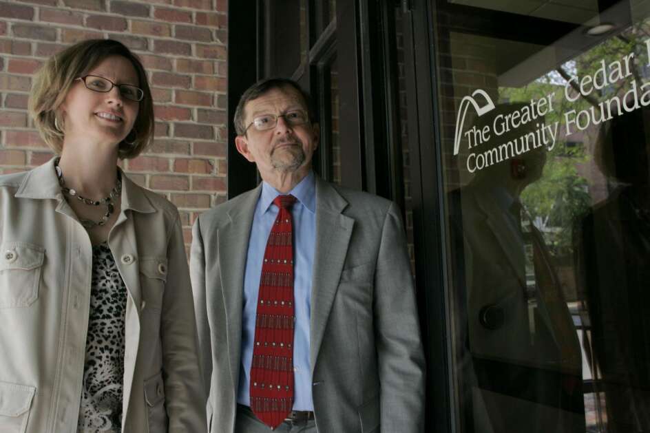 Karla Twedt-Ball (left) and Les Garner stand outside the Greater Cedar Rapids Community Foundation offices June 8, 2011, in Cedar Rapids. The foundation’s board on Thursday picked Twedt-Ball to succeed Garner as the foundation’s president and CEO. (The Gazette)