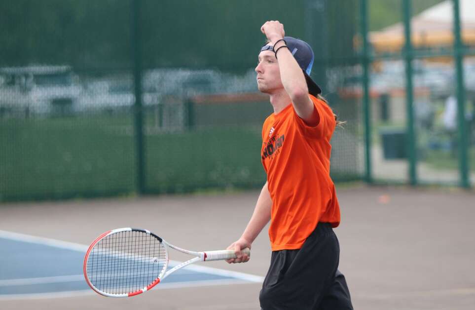 Fairfield’s Jace Hannes pumps his fist after a big point during the Class 1A district doubles tournament on May 8, 2023. (Andy Krutsinger/The Union)
