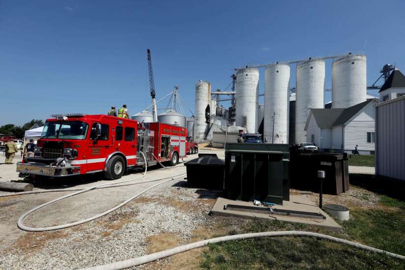 Crews recover man missing under collapsed Iowa grain silo