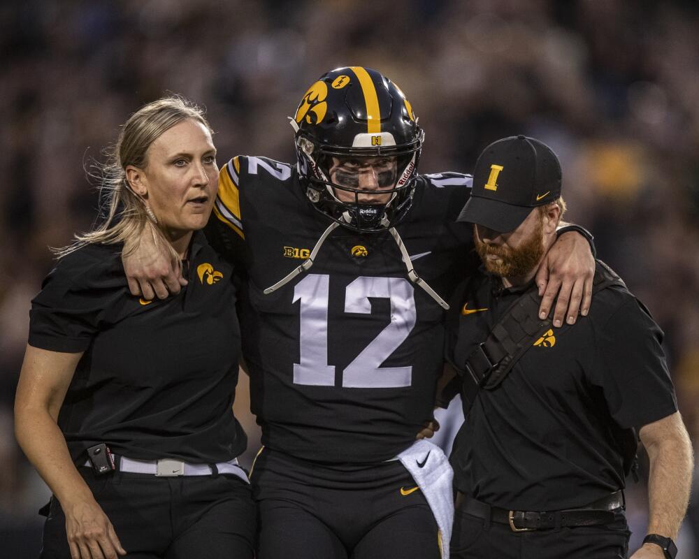 Iowa quarterback Cade McNamara is out of the game with an apparent leg injury