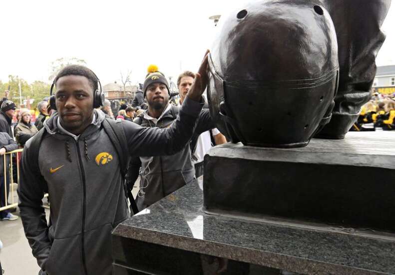 Judge in football discrimination suit orders University of Iowa to turn over reports on coaches