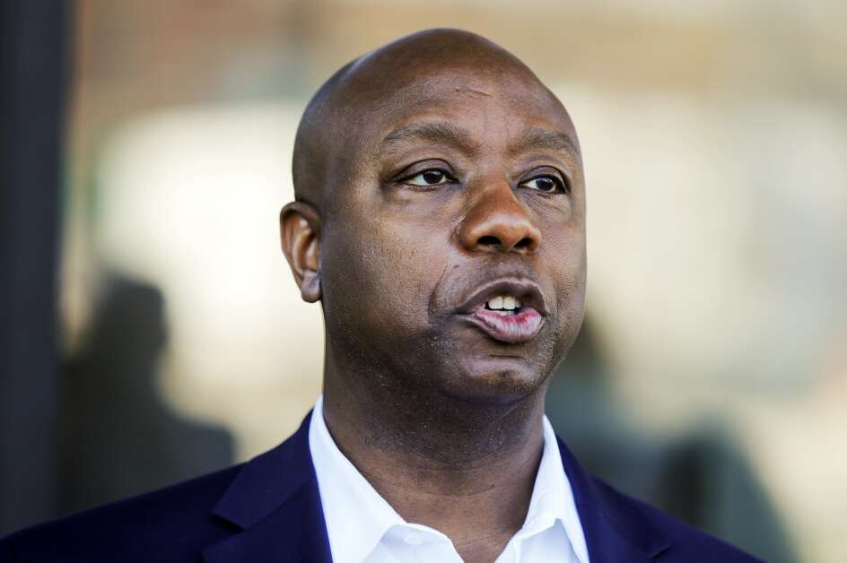 South Carolina Republican U.S. Sen. Tim Scott speaks to the press April 12 before a roundtable discussion with home-school families as well as Iowa Republican U.S. Rep. Ashley Hinson at the Marion Public Library. Scott made multiple stops in Iowa as part of his Faith in America Tour in preparation for his 2024 presidential run. (Jim Slosiarek/The Gazette)