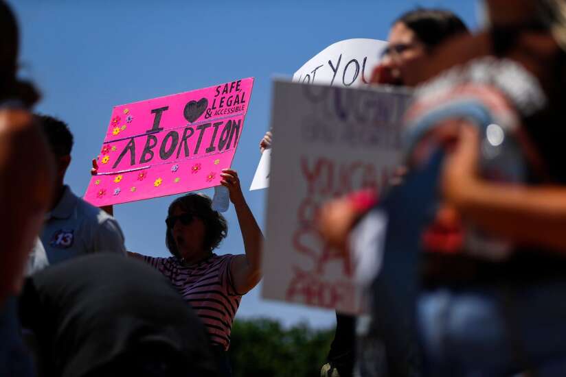 Hundreds decry abortion restrictions at Iowa Capitol rally