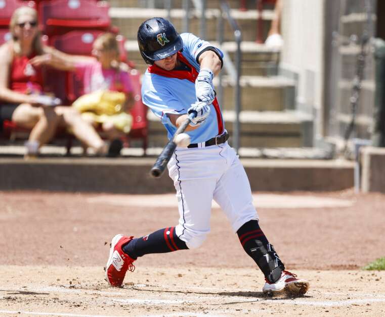 Cedar Rapids Kernels’ Tanner Schobel connects on an RBI single during their Midwest League baseball game against the Peoria Chiefs at Veterans Memorial Stadium in Cedar Rapids on Sunday, May 21, 2023. (Jim Slosiarek/The Gazette)