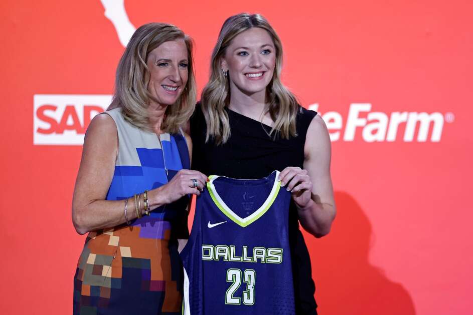 Iowa State's Ashley Joens, right, poses for a photo with commissioner Cathy Engelbert after being selected by the Dallas Wings at the WNBA basketball draft, Monday, April 10, 2023, in New York. (AP Photo/Adam Hunger)