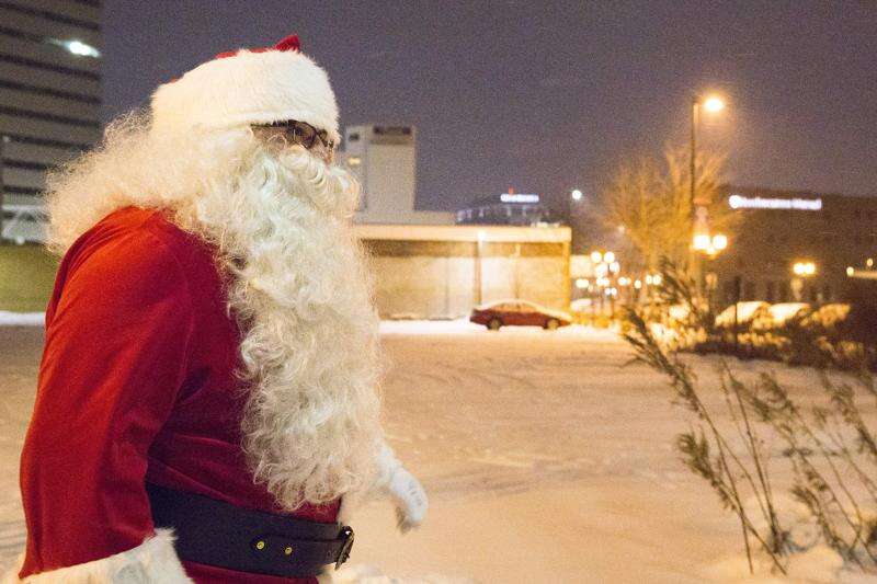 Canfield brings Christmas spirit to children of Cedar Rapids as Santa Claus