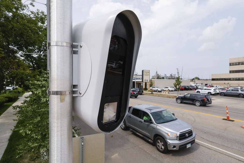 An automated traffic camera is seen Aug. 8, 2023, at the intersection of First Avenue SE and 10th Street SE in Cedar Rapids. The camera system has been updated with newer technology since the cameras were first installed in 2010. (Jim Slosiarek/The Gazette)