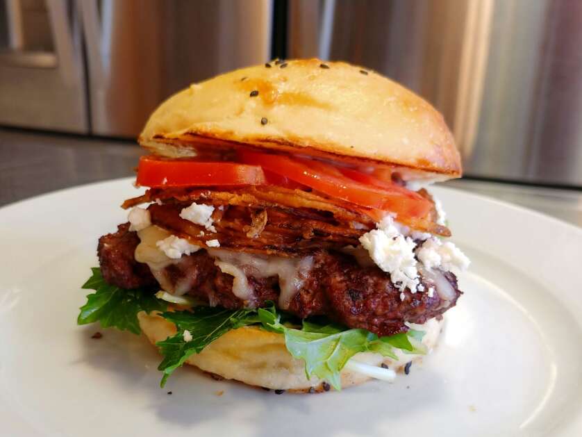Experiment with add-ons like goat cheese to elevate your basic burger. (Tom Slepicka)