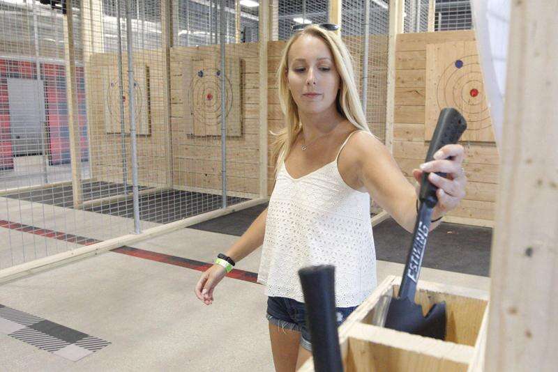 Blowing off steam: Ax throwing bar opens in Iowa City with safety stressed