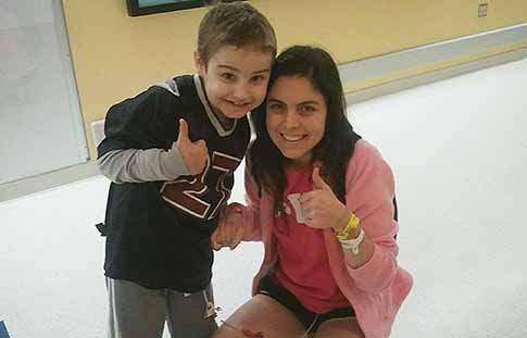 Christopher Turnis is pictured in 2014 along with Aly Becker, who at the time was a University of Iowa student and who -- like Turnis -- have a condition called eosinophilic esophagitis, which is like an allergy in the esophagus that makes the body attack many foods. (Contributed photo)