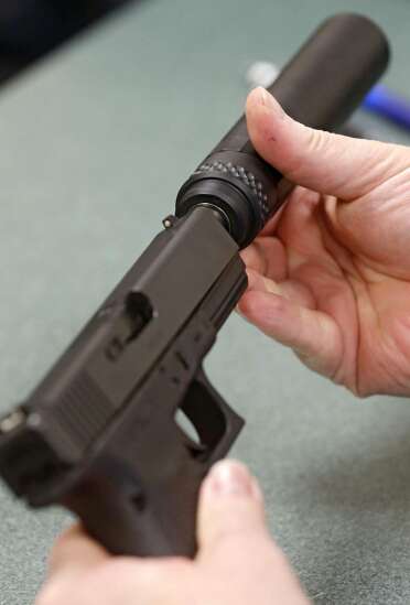 Gun suppressor buyers in Iowa to face long waits, high costs