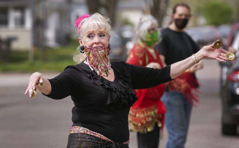 Photos and Video: Using belly dancing to connect with socially distanced neighbors in Cedar Rapids