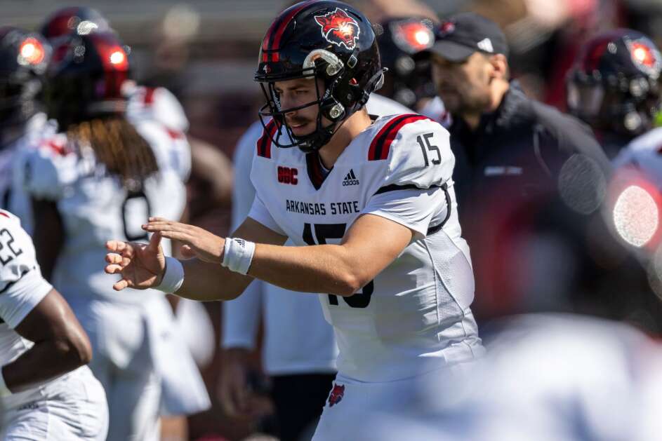 Arkansas State quarterback Jaxon Dailey (15) warms up before an NCAA football game against Troy on Saturday, Oct. 7, 2023, in Troy, Ala. (AP Photo/Vasha Hunt)