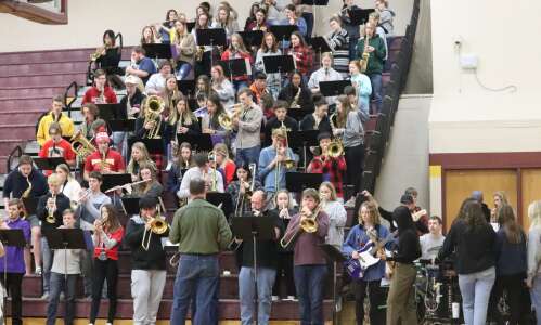Alumni and Friends Pep Band plays at Mt. Pleasant basketball…