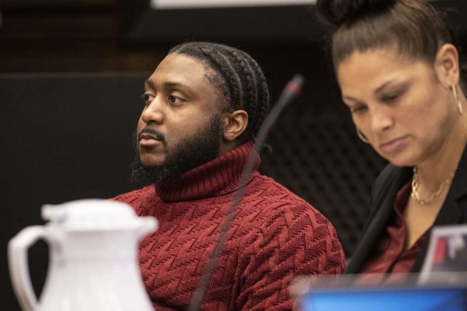 Defendant Duval Walker listens Thursday to opening statements at the Linn County Courthouse in Cedar Rapids. Walker, of Cedar Rapids, is charged with first-degree murder and other counts in the fatal shooting of Cameron Barnes, 32, on March 17, 2023, in Cocktails & Company in Marion. (Geoff Stellfox/The Gazette)