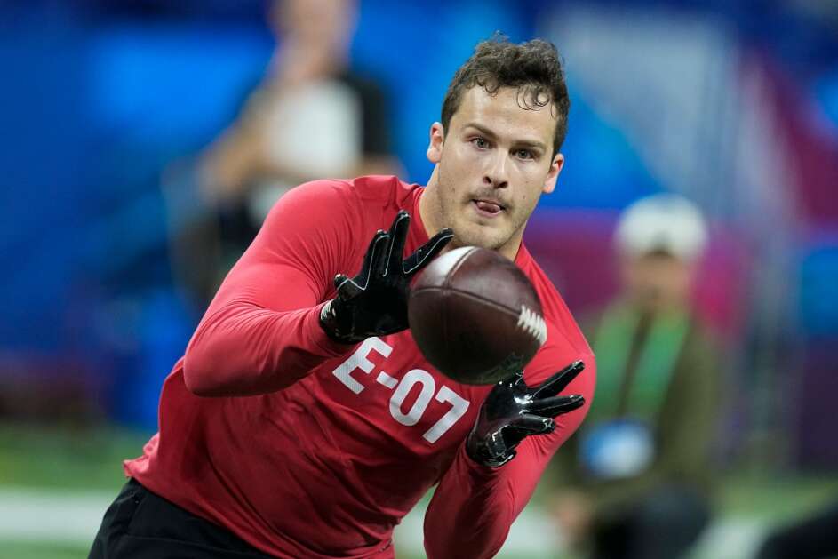 Iowa tight end Sam Laporta runs a drill at the NFL football scouting combine in Indianapolis, Saturday, March 4, 2023. (AP Photo/Darron Cummings)