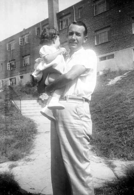 Frederick “Fred” Leonard Coste holds his daughter, Dianne, in 1953. (Supplied photo)