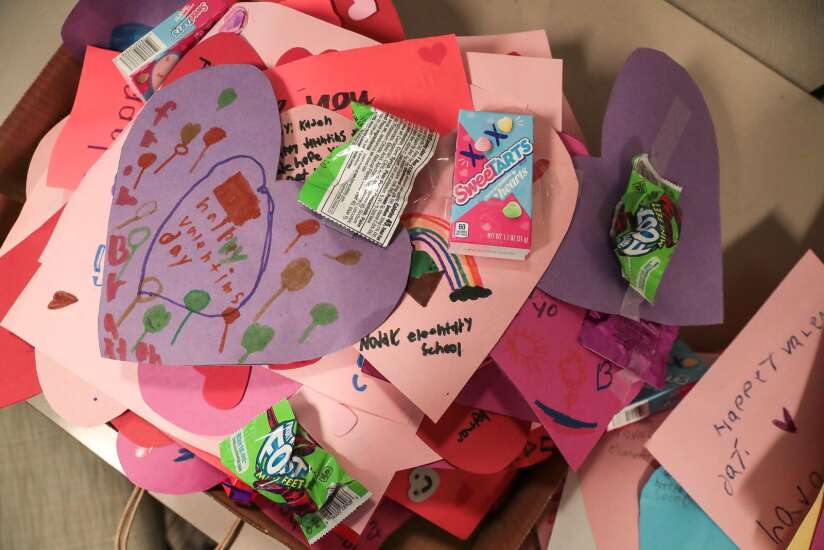 Elementary school students make Valentine’s Day cards for patients at Hall-Perrine Cancer Center