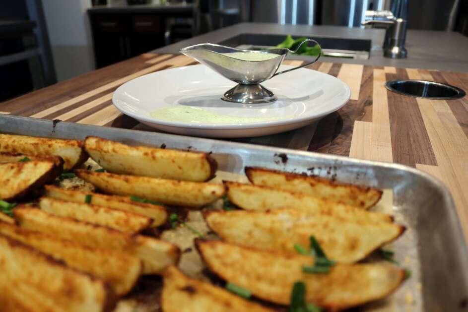 Homemade potato wedges go great with a burger and dipped in homemade aioli. (Tom Slepicka)