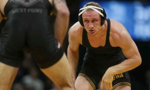 Iowa wrestling team: Student-athletes for real