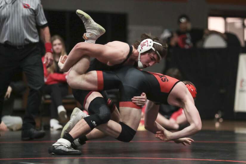 Linn-Mar fueled by physical, aggressive wrestling style in win over Cedar Rapids Prairie