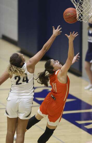 Photos: Solon at Cedar Rapids Xavier, Iowa high school girls' basketball