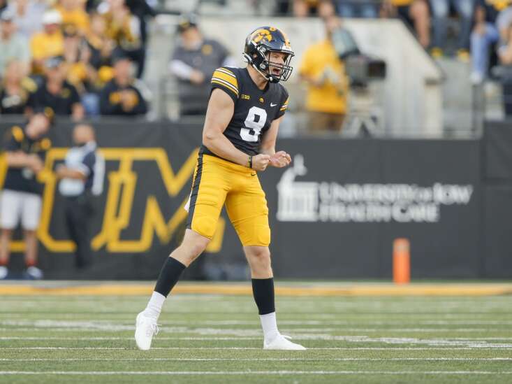 Iowa punter Tory Taylor works on fewer touchbacks, more spiral punts