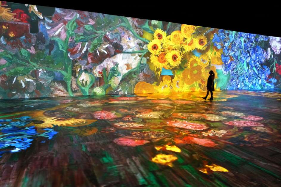 Dutch painter Vincent van Gogh found healing beauty in nature, often capturing the essence of flowers in his artwork. (Children twirl and dance through this projection of "The Starry Night," part of "Beyond Van Gogh: The Immersive Experience," on display through July 20, 2023, in Davenport's RiverCenter. (Paquin Entertainment Group)
