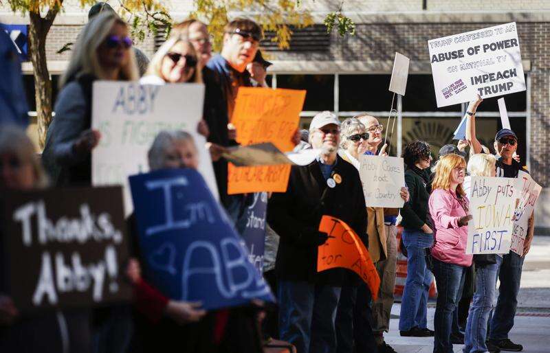 Competing impeachment rallies converge in Cedar Rapids