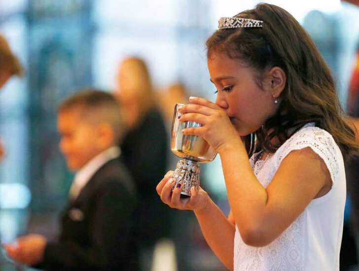 Catholic children prepare for First Communion