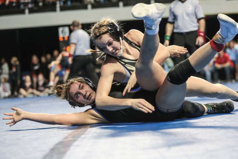 Photos: Iowa high school girls’ wrestling regional tournament in Cedar Rapids 