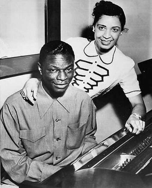 Nat King Cole and his wife, singer Maria Hawkins, are shown in 1951. The two had five children, including Natalie Cole, who became a well-known singer, and a set of twin daughters.