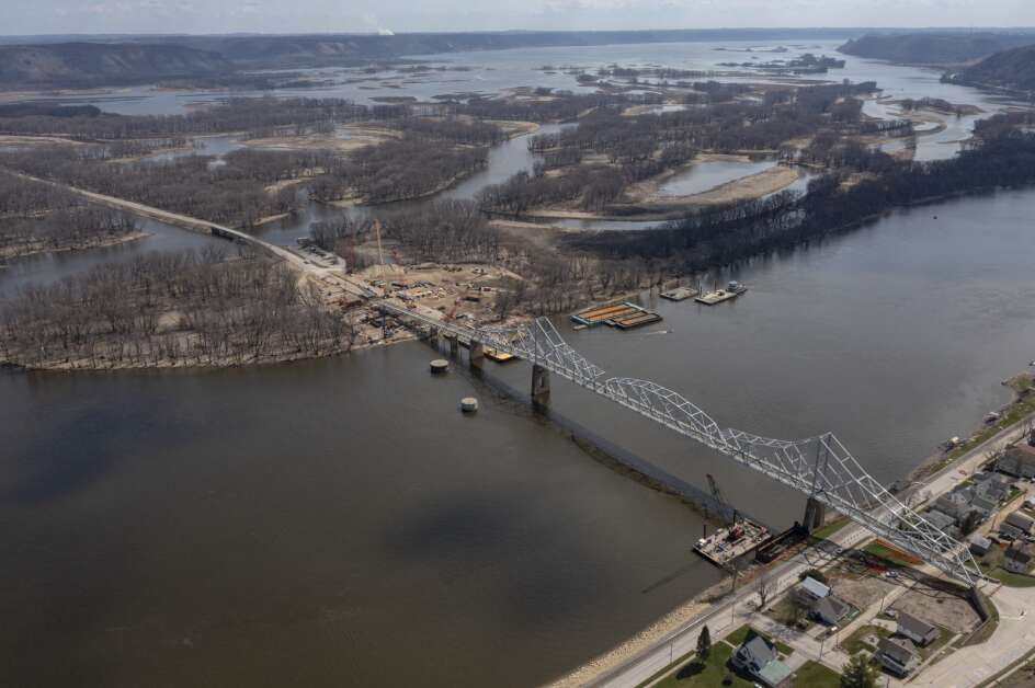 Construction on the Black Hawk Bridge in Lansing is seen in an April 10 aerial photo. The Black Hawk Bridge across the Mississippi River was closed Feb. 25 after it was found to be structurally unsafe. The bridge was repaired and reopened this weekend. (Nick Rohlman/The Gazette)