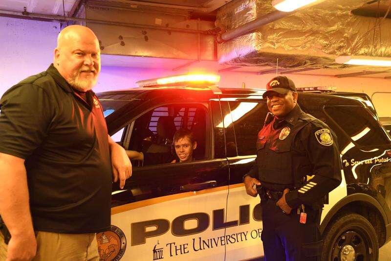University of Iowa police host surprise birthday visit for teen with Fetal Alcohol Syndrome